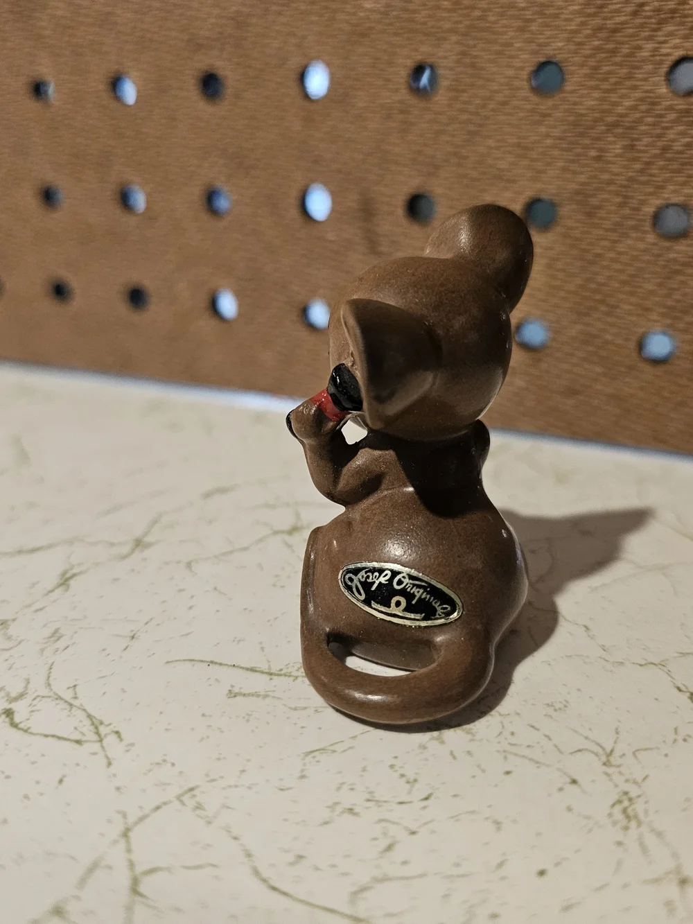 Brown Ceramic Mouse Figurine with Red Phone Decorative Accent